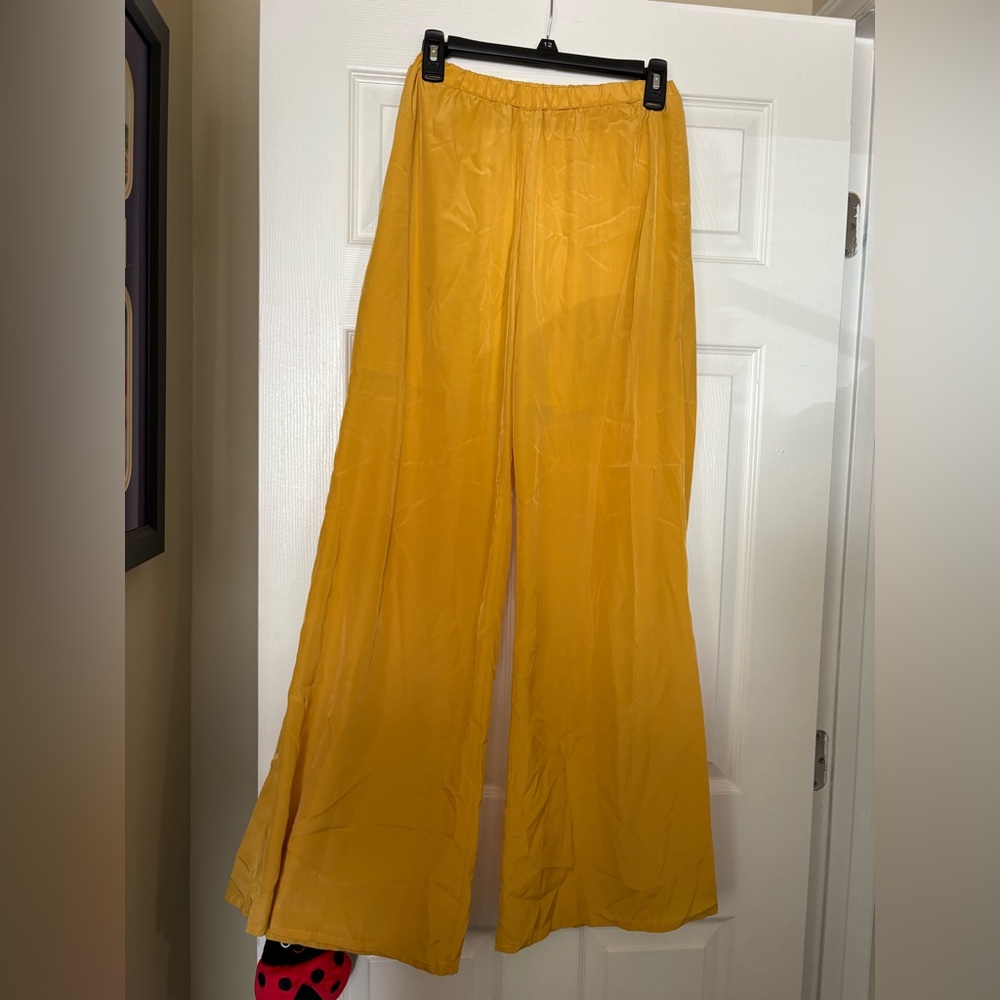 LONG yellow flowy pants.